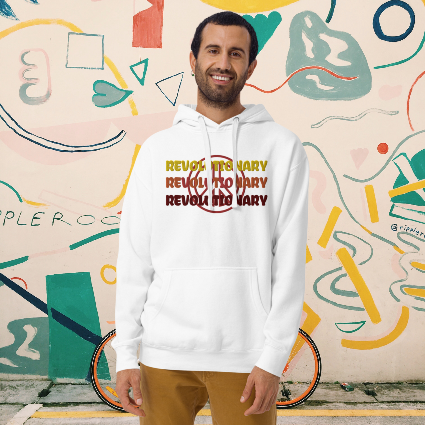 "REVOLUTIONARY" Unisex Embroidered Hoodie (Warm Theme)